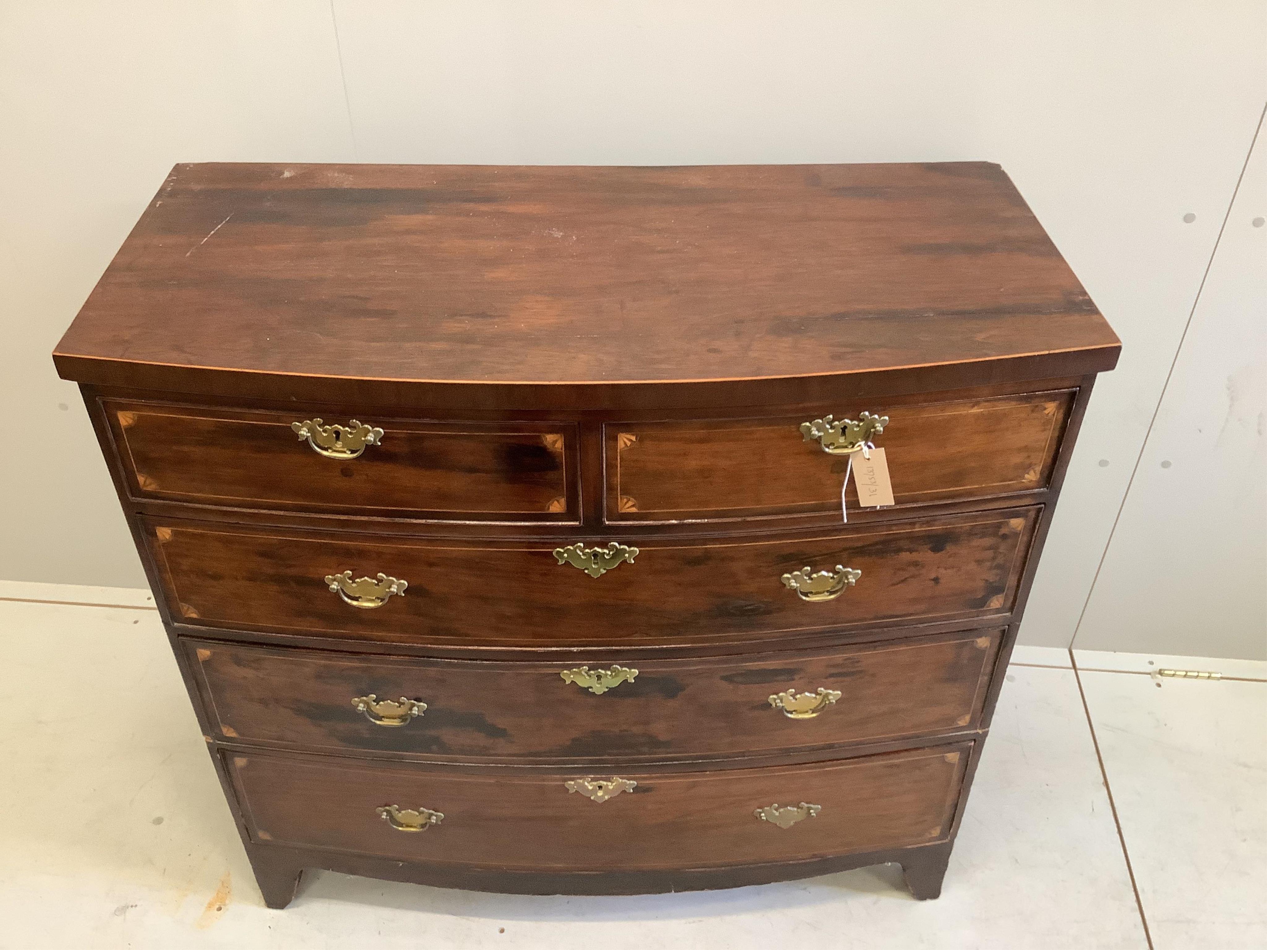 A late Georgian mahogany bowfront chest fitted two short and three long drawers, line and fan inlay, - Bild 2 aus 2