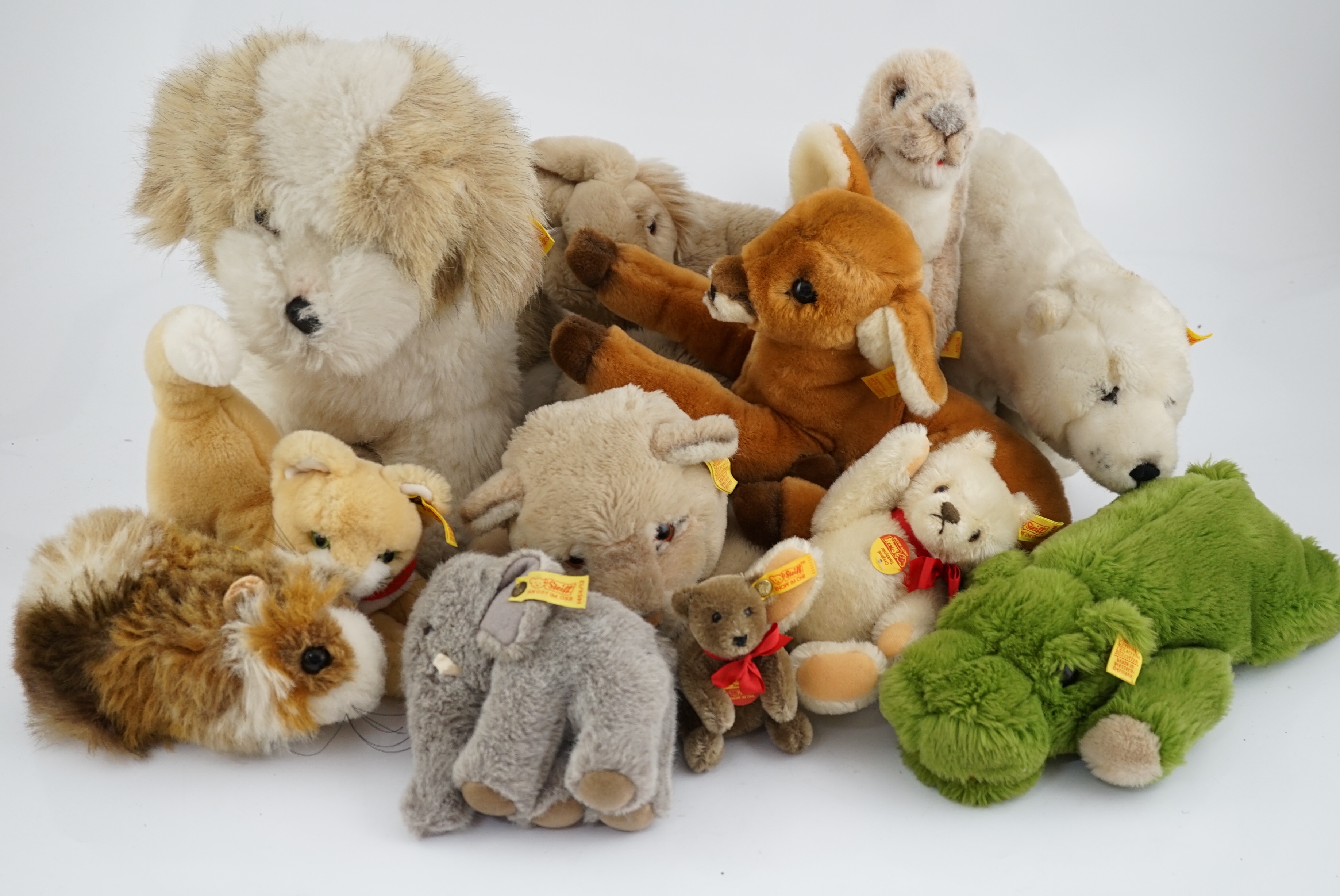 Ten assorted Steiff yellow tag animals, two yellow tag bears, together with Steiff catalogues