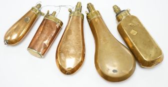 Five 19th century copper and brass powder flasks, all with plain copper bodies. Condition - fair