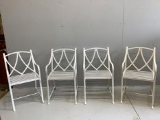 A set of four painted wrought iron strapwork garden chairs, width 51cm, depth 64cm, height 90cm.