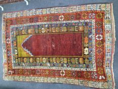A Turkish prayer rug, 170 x 116cm. Condition - poor