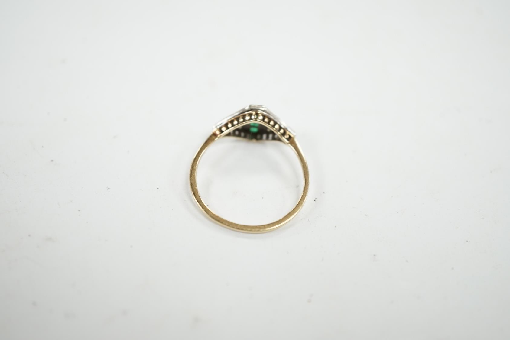 A small early 20th century 15ct, emerald and diamond cluster set ring, size P, gross weight 1.6 - Image 10 of 11