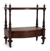 A Victorian mahogany bow fronted two tier whatnot, with fitted drawer, width 66cm, height 73cm.