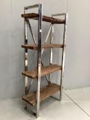 A Contemporary weathered hardwood and chrome set of open shelves, made from old train rail track