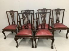 A set of six early 20th century Chippendale style mahogany dining chairs, two carvers. Condition -