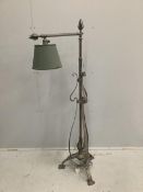 An Arts & Crafts wrought iron telescopic lamp standard. Condition - fair