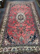 A Hamadan red ground carpet, 475 x 275cm. Condition - a couple of small patches of old moth damage