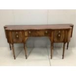 A late George IV mahogany serpentine front sideboard, width 226cm, depth 67cm, height 96cm.