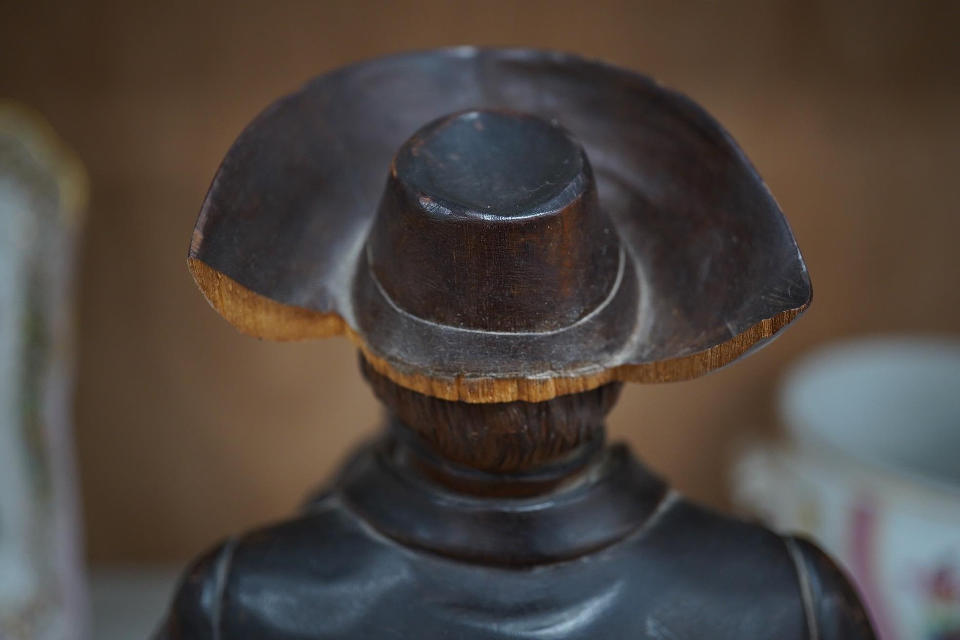 A 19th century Black Forest figure of a gentleman smoking a pipe, hinged at the waist to hold - Image 8 of 9