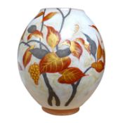A Chinese terracotta and enamel vase with gilded leaf decoration, seal mark to the base, 23cm