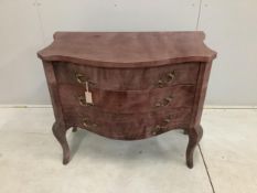 A Continental serpentine three drawer commode with simulated marble covering, width 91cm, height