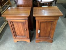 A pair of modern Continental cherry wood bedside cupboards, width 47cm, height 75cm. Condition -