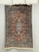 An Indian Persian style rug, 180 x 118cm. Condition - good