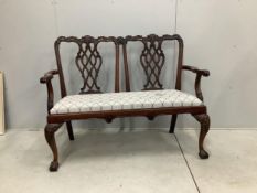 A Chippendale Revival mahogany chair back settee, width 137cm, height 103cm. Condition - good but