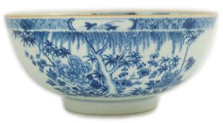 A Chinese blue and white bowl, Yongzheng/Qianlong period, the exterior painted with trees, bamboo,