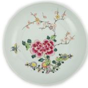 A Chinese famille rose ‘peony and prunus’ saucer dish, Yongzheng mark and period (1723-35), finely