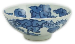 A Chinese blue and white ‘cloud and dragon’ bowl, Yongzheng mark and period (1723-35), painted to