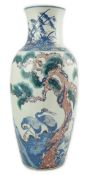 An unusual Chinese underglaze blue and copper red ‘longevity’ vase, 19th century, of elongated ovoid