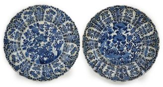 A pair of Chinese blue and white chargers, Kangxi period (1662-1722), each painted to the centre