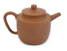 A Chinese Yixing pottery teapot, 18th century, of cylindrical form with a slightly domed cover,