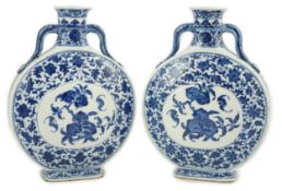 A near pair of Chinese blue and white moonflasks, bianhu, Daoguang seal marks and of the period (