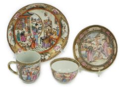 A Chinese ‘mandarin’ pattern tea bowl, coffee cup and saucer, Qianlong period, each piece finely