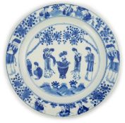 A Chinese blue and white 'ladies' plate, Kangxi mark, 19th century, painted with four ladies in a