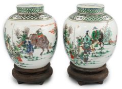 A pair of large Chinese famille verte globular jars and covers, early 20th century, each painted