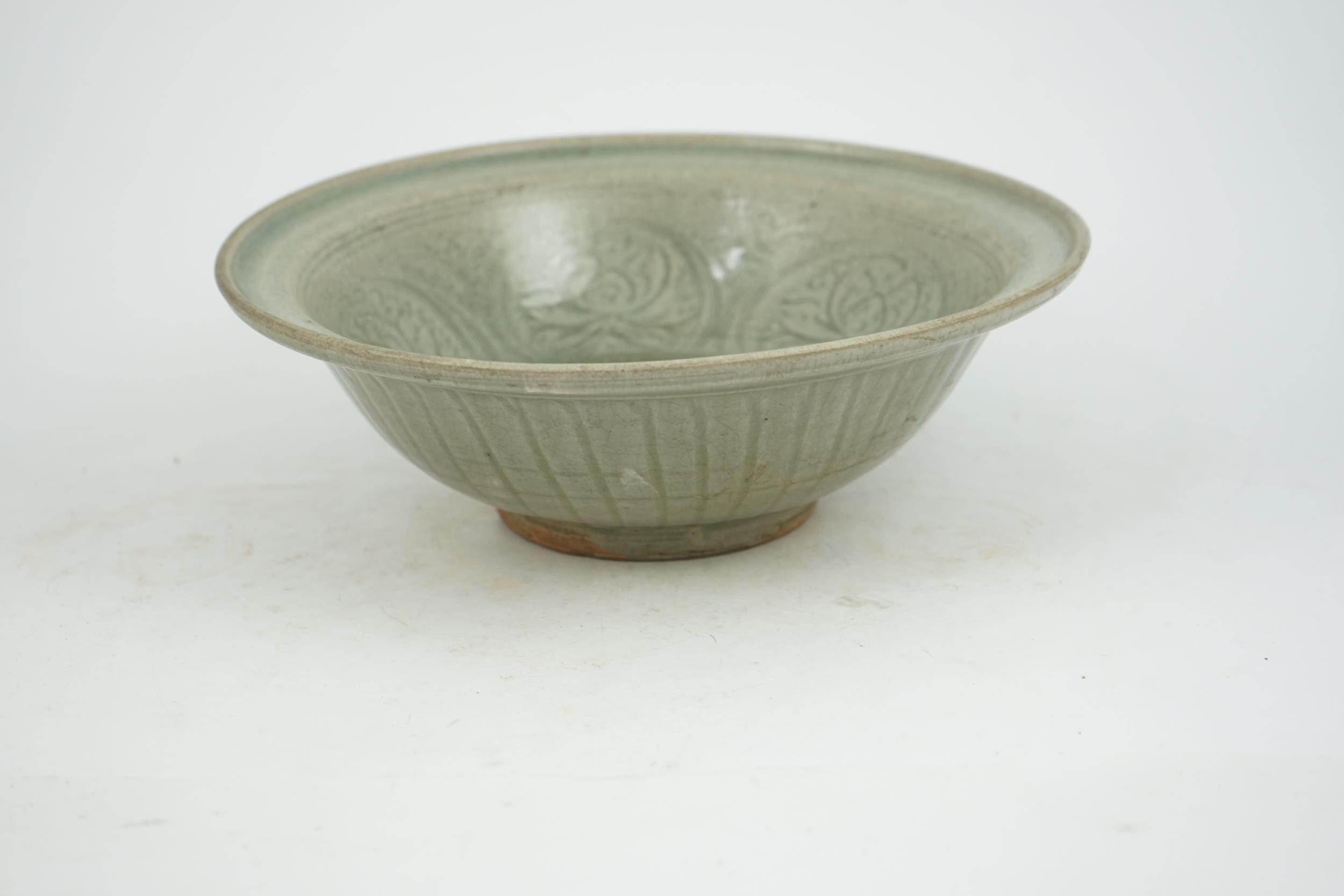 A large Thai celadon glazed bowl, Sawankhalok kilns, 14th / 15th century, heavily-potted with flared - Image 4 of 6