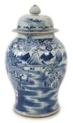 A massive Chinese blue and white ‘temple’ jar and cover, Qianlong period, painted with a temple