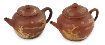 Two Chinese Yixing slip-decorated miniature teapots and covers, 18th/19th century, each decorated in