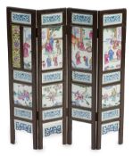 A Chinese wood framed and porcelain mounted low screen, late 19th century, the four upper panels