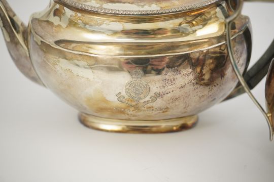 An Edwardian silver teapot and a matching sugar bowl, with engraved inscription, relating to the - Image 4 of 10