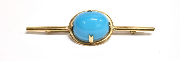 NATURAL TURQUOISE BROOCH An intense sky blue turquoise oval cabochon, approx 19.4 x 16.1mm, in a 9ct
