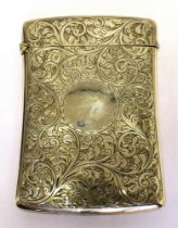 A SILVER CARD CASE WITH ALL OVER CHASED FOLIATE SCROLL. Circular vacant cartouche, makers mark H.W.