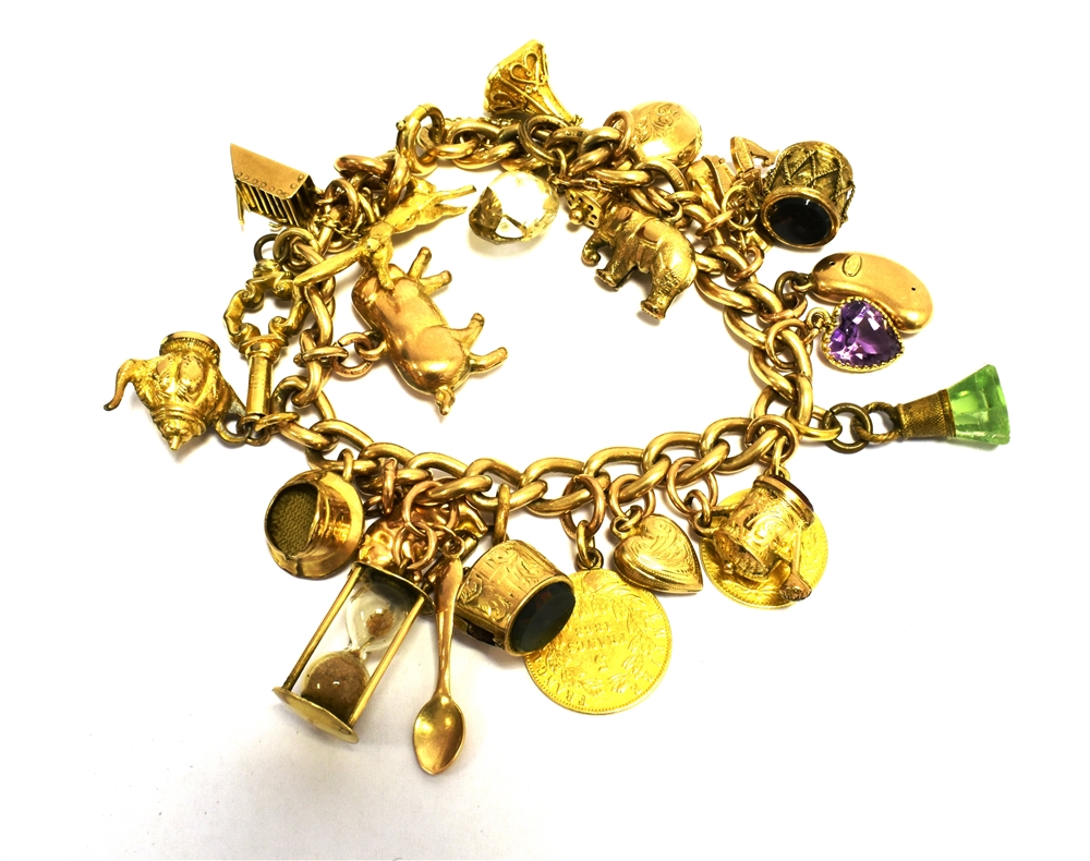 VINTAGE CHARM BRACELET The curb link stamped 9.375 with numerous charms to include marked 9c Gross - Image 2 of 2