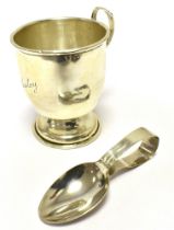 A SILVER CHRISTENING CUP TOGETHER WITH A SILVER BABY PUSHERS SPOON. The cup engraved Lesley. Total