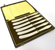 CASED SET OF SIX SILVER-HANDLED BUTTER KNIVES.