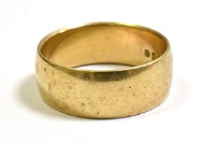 9CT GOLD PLAIN WEDDING BAND 6.5mm wide, hallmarked 375 London 1976. Ring size L. Weight 3.9 grams.