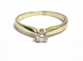18CT WHITE GOLD DIAMOND SOLITAIRE With V claw setting containing a round brilliant cut diamond,
