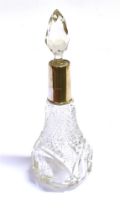 ANTIQUE SILVER MOUNTED SCENT BOTTLES To include a 20cm tall, George V cut crystal scent bottle