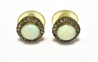VINTAGE OPAL HALO STUD EARRINGS The earrings set with a circular opal measuring 9mm in diameter in a