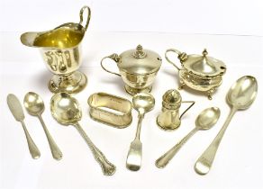 A COLLECTION OF SILVER COMPRISING : A silver creamery, two cruets (no glass liners), napkin ring,