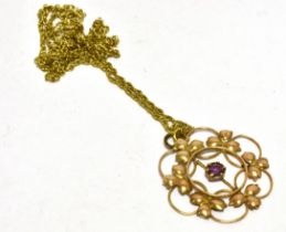 EARLY 20TH CENTURY PENDANT AND CHAIN the garnet paste set openwork pendant stamped 9ct suspended