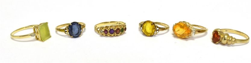 SIX DRESS RINGS Stone and paste set. Shanks marked 9k/375. Sizes N, N1/2, O O , O1/2, R1/2. Sold