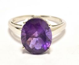 TJC AMETHYST COCKTAIL RING The amethyst measuring approx 11 x 9mm on a white metal band stamped