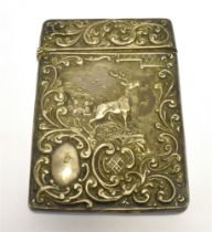 A SILVER CARD CASE The case ornately embossed in scroll pattern and featuring an embossed stag and