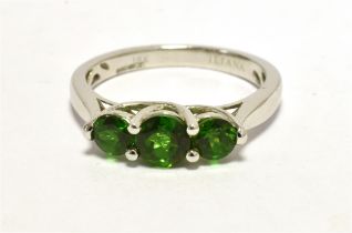 ILIANA 18k GREEN GARNET THREE STONE DRESS RING In white metal stamped Iliana 18k. Ring size O1/2