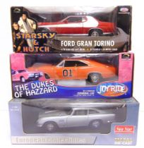 THREE 1/18 SCALE DIECAST MODEL CARS comprising a Sun Star No.1005, 1963 Aston Martin DB5, silver