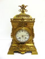 A FRENCH GILT-BRASS MANTEL CLOCK late 19th century, the 9cm diameter circular white enamel dial with